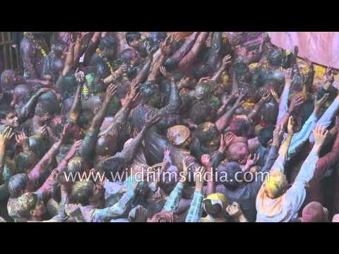 Teeming Hindu masses celebrate Holi at Banke Bihari Temple in the heartland