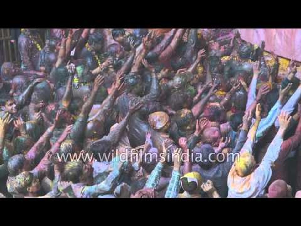 Teeming Hindu masses celebrate Holi at Banke Bihari Temple in the heartland