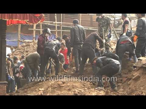 Emergency rescue workers clear debris in Basantapur Durbar Square, Nepal