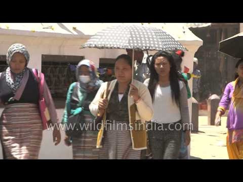 After earthquake tremors people visit Boudhanath Stupa - Nepal