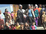 Nepalese men and women on the streets, homeless and destitute post earthquake