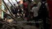 Earthquake victims search for belongings at collapsed house in Sankhu, Nepal