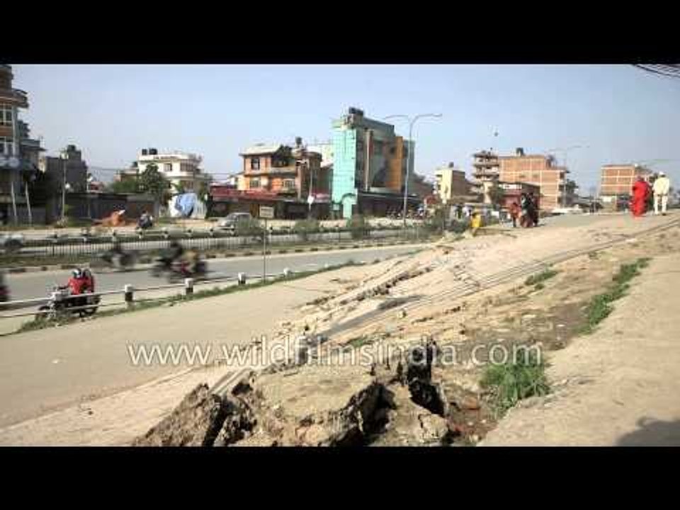 Damaged roads are seen after an earthquake on the outskirts of Kathmandu