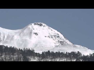 Snow covered Garhwal Himalayas as seen from the top of Jankichatti