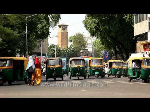 Auto rickshaws, motorbikes, cars fill Gujarat streets
