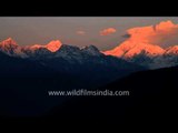 Clouds moving in fast motion over Kanchenjunga