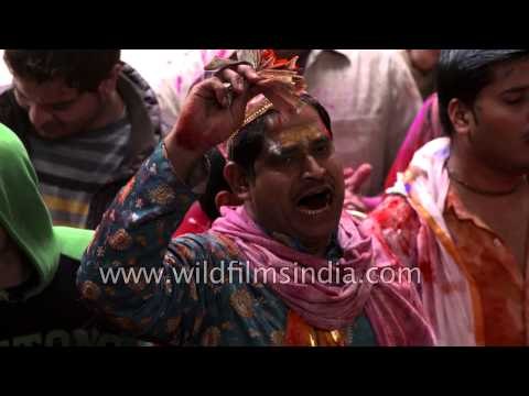 Indian devotees sing religious songs : Holi procession in Gokul