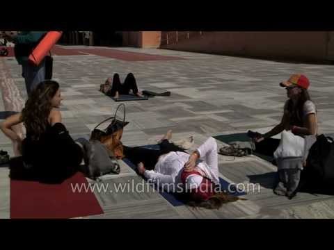Foreign tourists relaxing on Parmarth Ghat - Rishikesh