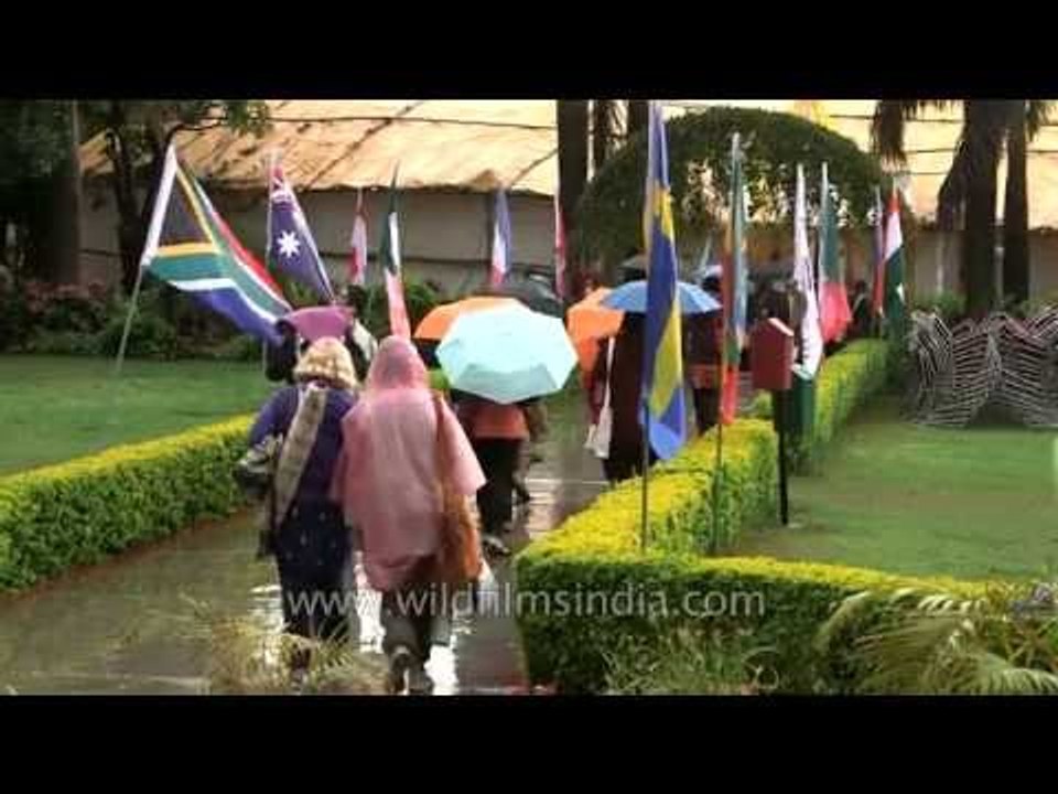 Foreigners walk to their classes on a rainy day - Parmarth Ashram