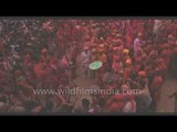 People play with colors to celebrate the Lathmar Holi festival - Barsana