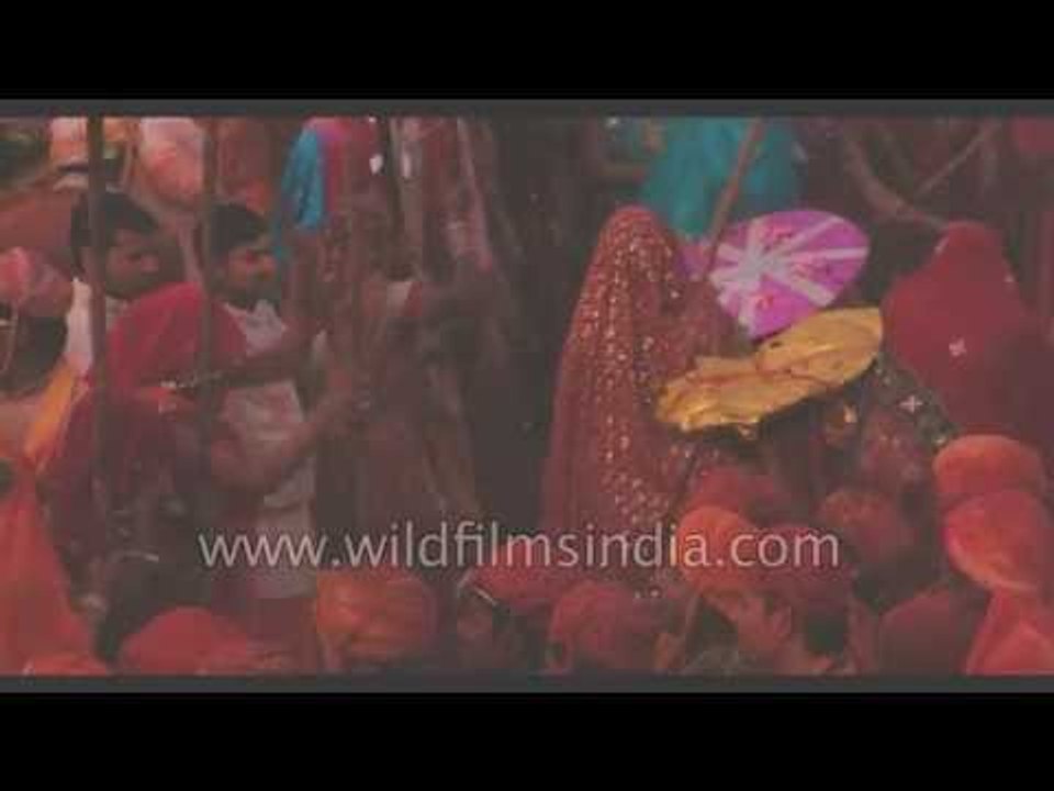 Women of Barsana beating men of Nandgaon - Lath...