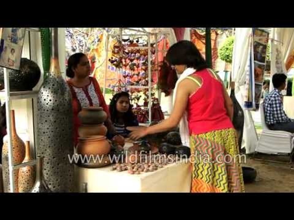 Salwar kameez suits, dresses and earthenware for sale in India