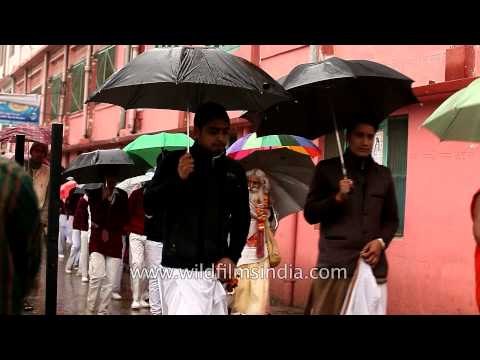 Students walk to classes in the rain - Rishikesh