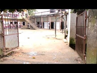 Mother drops daughter to school in scooty - Mizoram