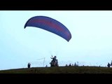 Pilot launches into blue sky : Paragliding in Mizoram