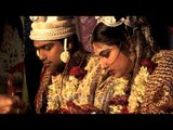 Bengali bride and groom perform wedding rituals
