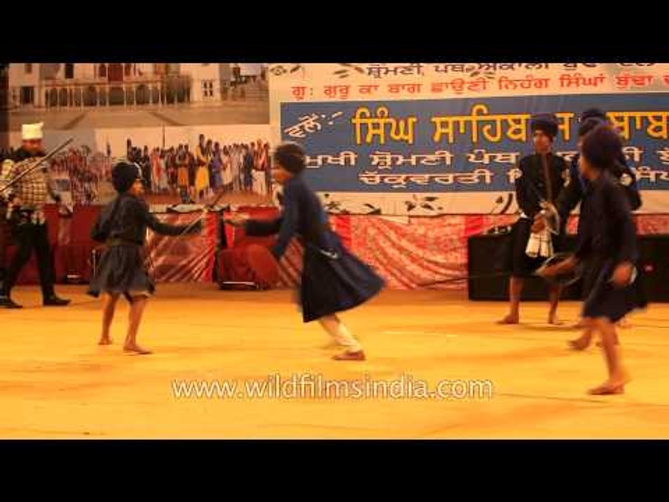 Young Nihang trainees perform Gatka martial arts, Punjab