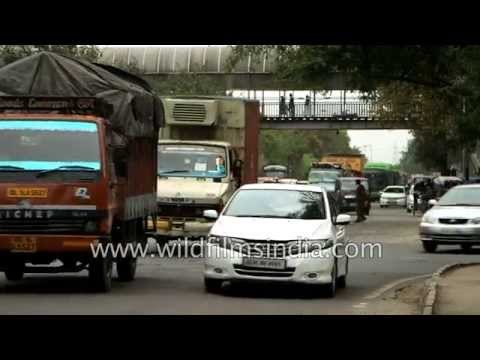 Cycle rickshaws and assorted Delhi traffic at Maharani Bagh