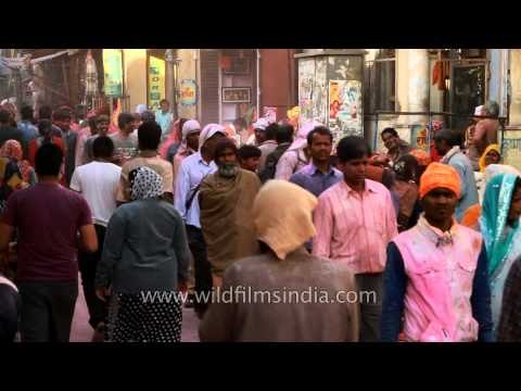 Smeared with colors, Holi participants at Bihari jee market - Vrindavan