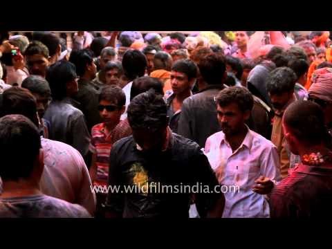 Holi revellers queue up to enter Banke Bihari temple in Vrindavan