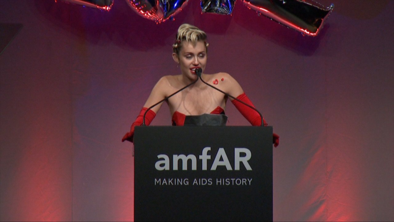 Miley Cyrus Honored In Very Sexy Red Dress At amfAR Gala