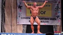 Russian bodybuilder dance like a Bollywood film star and then a chicken during a competition