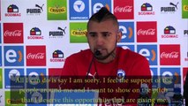 Arturo Vidal cries during a press conference, apologising for his actions