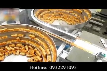 Máy đóng gói kẹo lạc có cấp liệu tự động