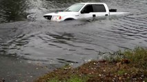 CAPTION THIS!  Ford F150 Almost Completely Sinks In A Pond