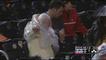 Fan Struggles to Put His Poncho on, Poncho Wins