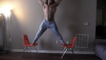 Man carries 45 kilos splits on two chairs