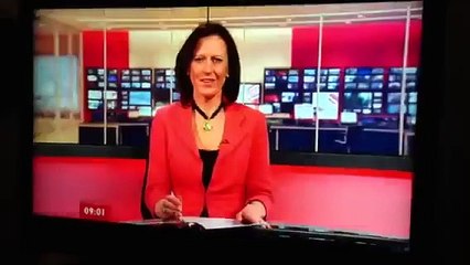 TV Blooper Funny - Newswoman Sneeze repressed pops out!