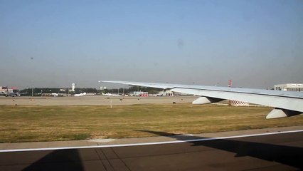 Takeoff from Beijing Capital International Airport (PEK) on Emirates 777-300ER