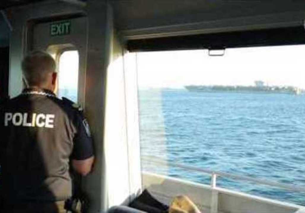 Queensland Police Help Shepherd US Aircraft Carrier Into Brisbane Port