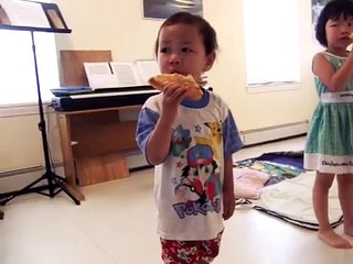 My kids eating pizza for dinner at home