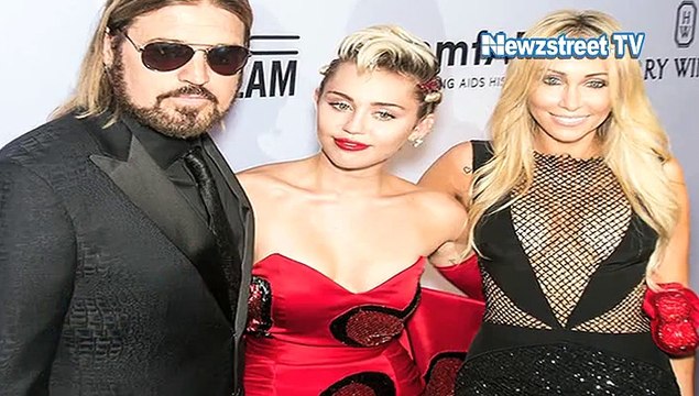 OMG- Miley Cyrus’s mother suffers nip slip