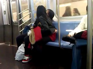 Weird couple makeout on the NYC subway