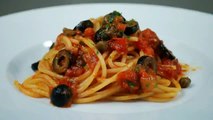 Spaghetti alla puttanesca, italian traditional recipe