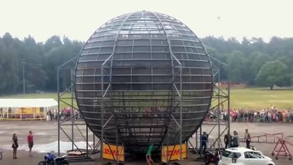 Car does 12 death loops in world's biggest cage