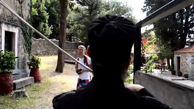 Orthodox Priest Ringing Bell's in Crete.