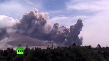 Gas Clouds  Mount Sinabung volcano spews hot ash in Indonesia