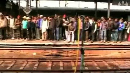 Monkey saves dying friend at Indian train station