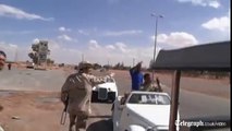 Libyan fighters loot Muammar Gaddafi's luxury cars
