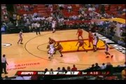 Dwayne Wade crosses Kirk Snyder