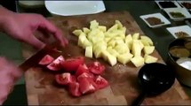 How to Cook Cauliflower with Potatoes : How to Cut Tomatoes and Add Spices