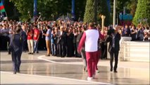 Ilham Aliyev receives Olympic torch of the Baku 2015 European Games