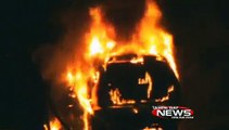 Firefighters put out fully involved van fire