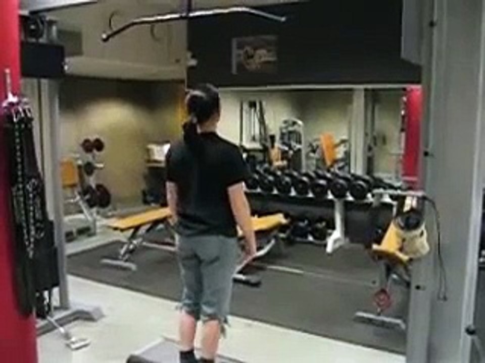 Girl doing 16 pullups (properly)