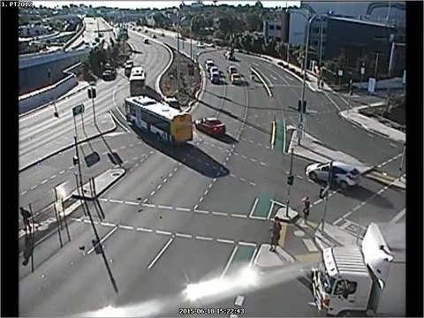 Motorcycle narrowly misses pedestrians following crash