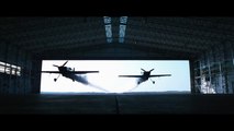Two Planes Fly Through a Hangar – Red Bull Barnstorming Low Pass